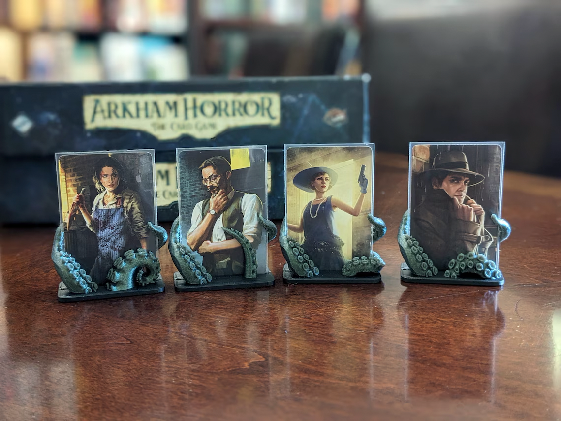 Top Shelf Gamer | The Best Arkham Horror: The Card Game Upgrades and Accessories | Investigator Card Stands compatible with Arkham Horror LCG (set of 4) Top Shelf Gamer | The Best Arkham Horror: The Card Game Upgrades and Accessories | Investigator Card Stands compatible with Arkham Horror LCG (set of 4)